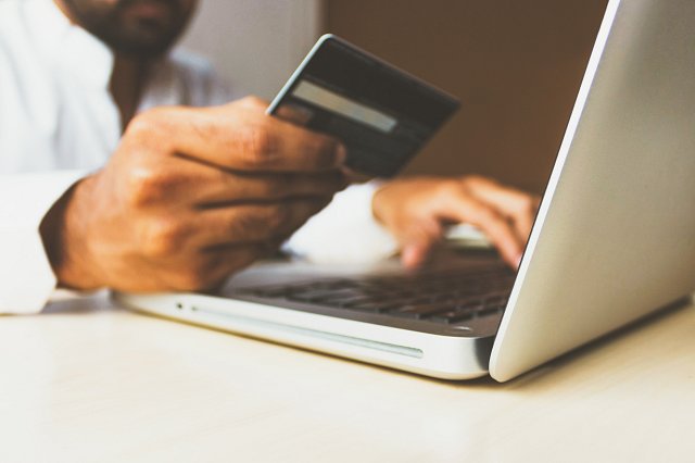 Man filling out credit card details online